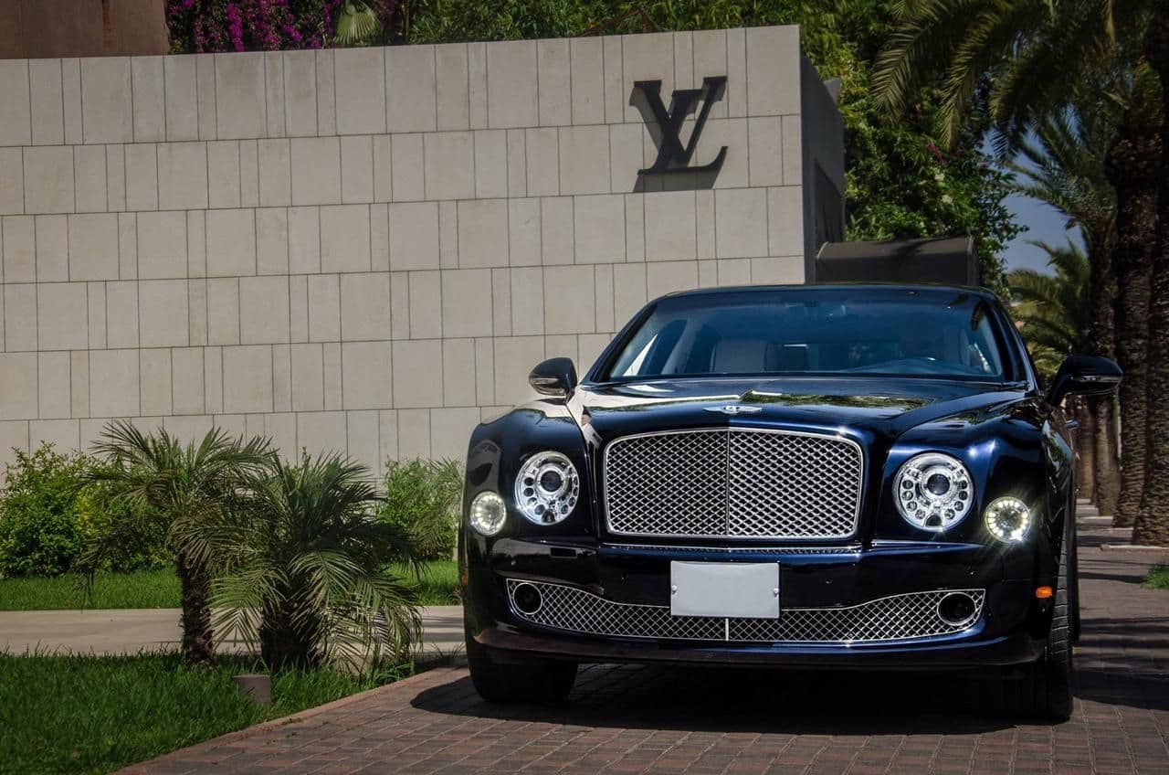 Bentley Mulsanne — Grand tourer parked at Louis Vuitton